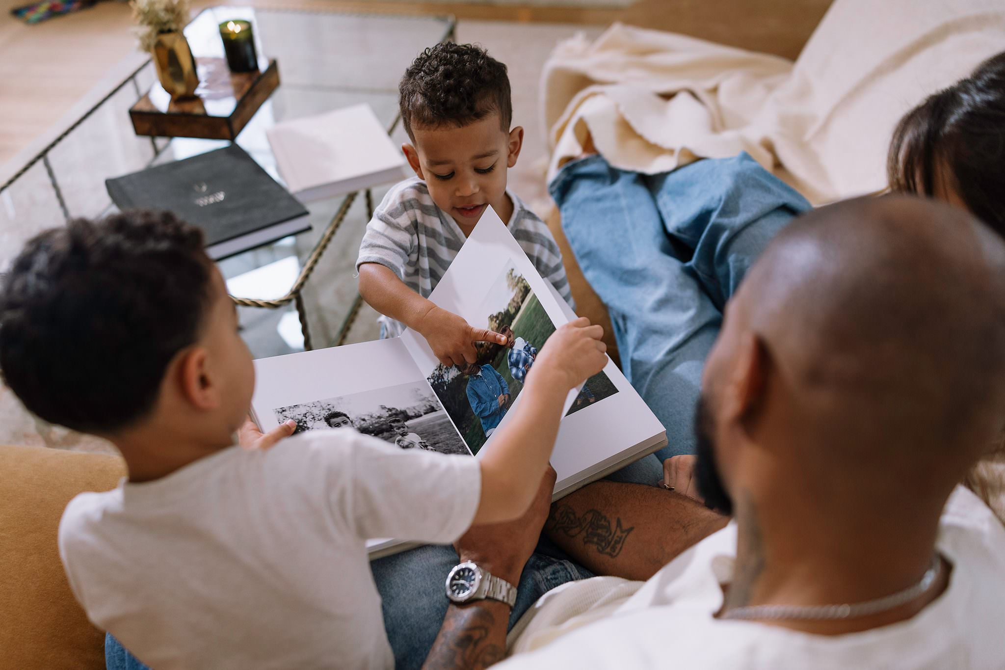 A family looking through their Lite Album together